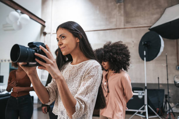 istock Photographer working in a fashion studio 1345149078