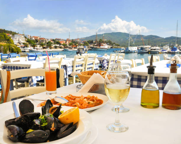 istock Seafood dinner in greek restaurant on seaside in Greece 1345150647