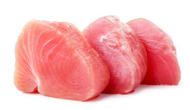 istock Raw tuna fish medallions on a white background. Isolated 1345151701