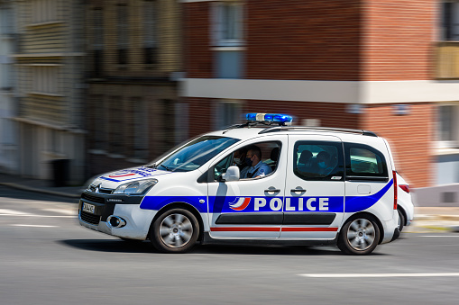 Le Havre, France - June 10, 2021: Side view of a screen printed police car (Citroën Berlingo II) from the french \