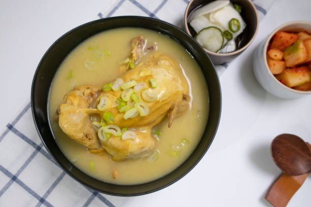 steaming samgyetang, chicken soup with ginseng korean food