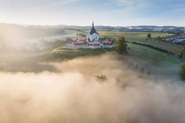 Aerial view of the church St. John of Nepomuk. Zdar nad Sazavou. The Pilgrim Church of Zelena hora.
UNESCO World Heritage Site in beautiful golden morning light at sunrise in fall, Czech Republic