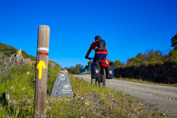 biker en via de la plata camino andalucía españa - saddlebag fotografías e imágenes de stock