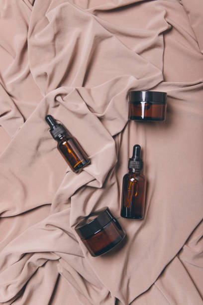 istock stylish cosmetic bottles on a light background 1345163245