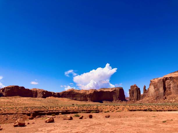 istock Monument Vally / Elephant Butte and white cloud. 1345163423