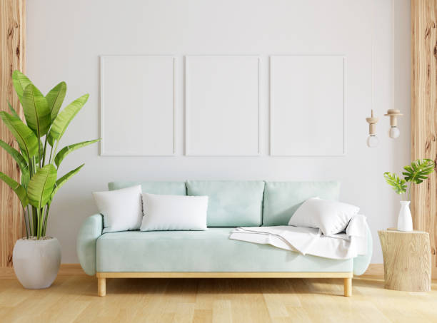 Green sofa in living room with Three frame mockup, 3D rendering Green sofa in living room interior with Three frame mockup, 3D rendering three objects photos stock pictures, royalty-free photos & images