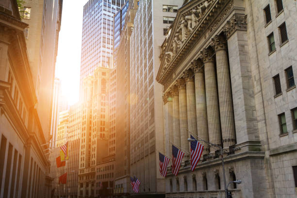 historic buildings of the financial district in lower manhattan, new york city near wall street - wall street new york stock exchange stock exchange street imagens e fotografias de stock