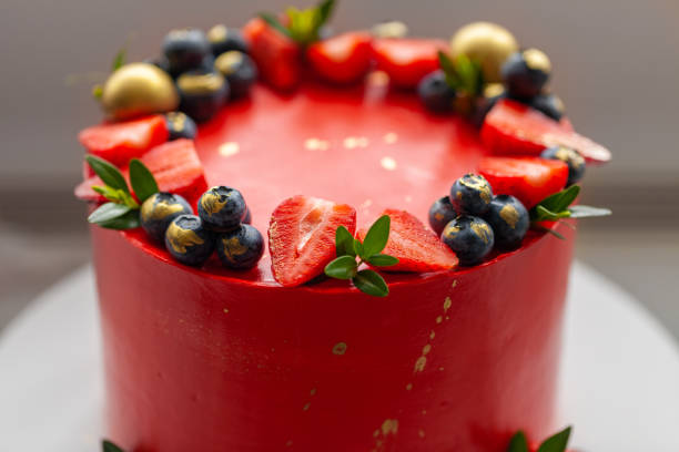 istock Red cake with cream cheese frosting for a big event. 1345165071