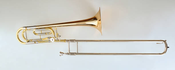 istock Trombone with transposer mounted on a white table top view 1345168186