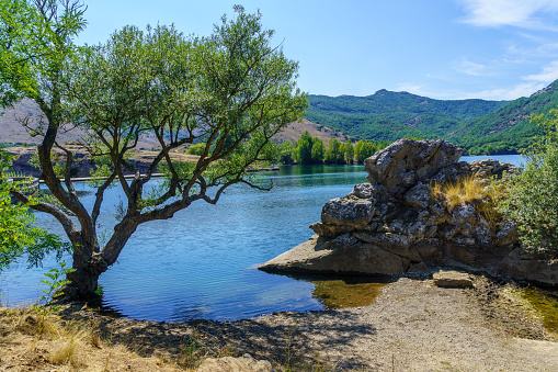 View of the Ruesga reservoir in Cervera de Pisuerga, Palencia, Spain. Calm and tranquility