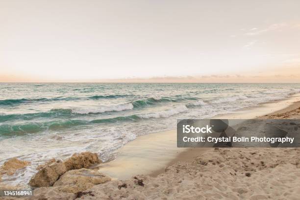 Pastel Sunset Sky Over The Palm Beach Florida Shoreline Stock Photo - Download Image Now