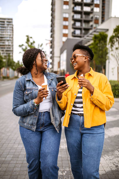 Two friends having fun in the city