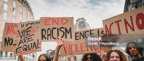 People Are Marching On Strike Against Racism Stock Photo - Download Image Now - Anti-racism, Racism, Protest