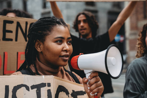 istock People are marching together on strike against racism 1345174130