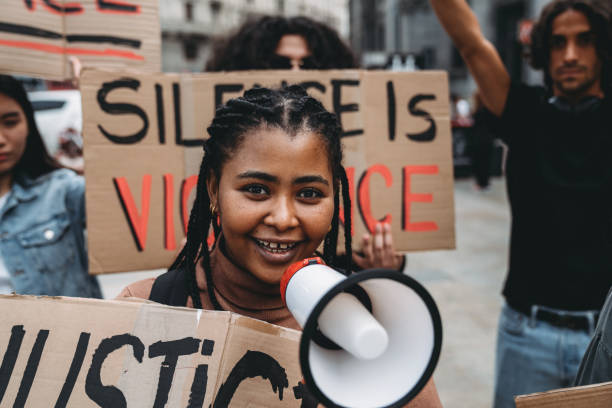 istock People are marching together on strike against racism 1345174138