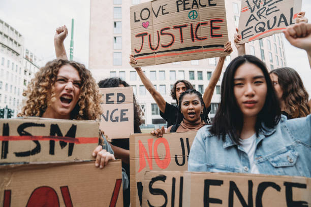 istock Crowd of people on strike against racism 1345174164