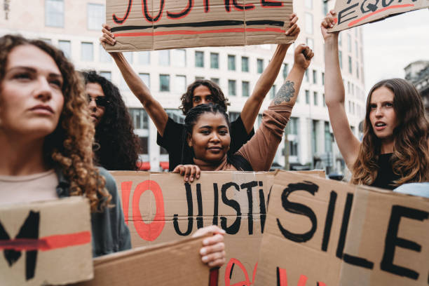istock Crowd of people on strike against racism 1345174167