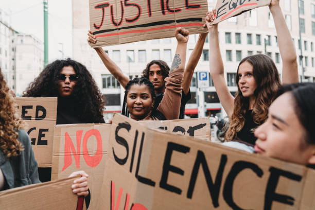 istock Crowd of people on strike against racism 1345174170