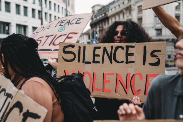 istock People are marching together on strike against racism 1345174187
