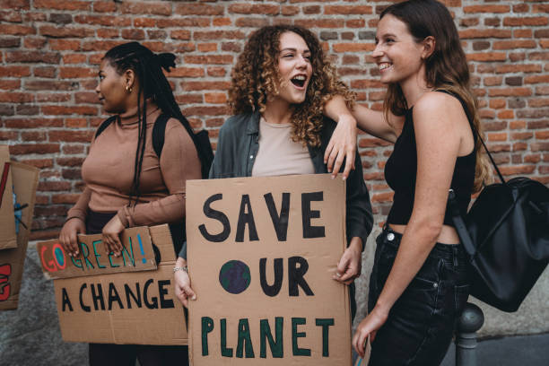 istock People are holding banner signs while they are going to a demonstration against climate change 1345174280