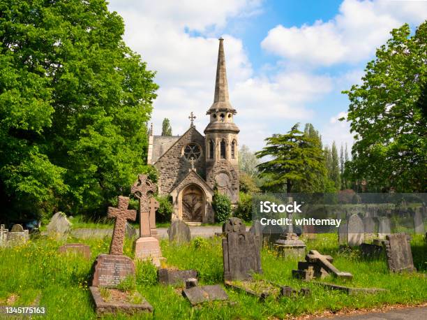 Old Chapel And Gravestones In A Cemetery Stock Photo - Download Image Now - Church, UK, Run-Down