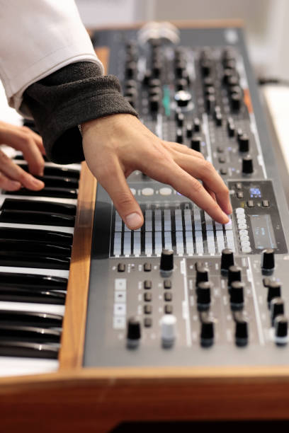 istock musician making music with analog synthesizer 1345178066