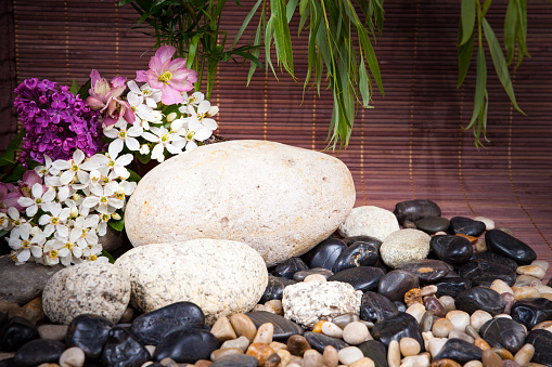 Aromatherapy, spa, beauty treatment and wellness background with massage stone, flowers ... spa concept