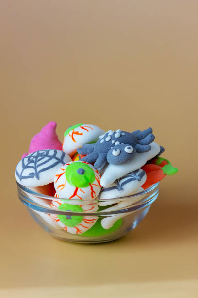 istock A creative idea for serving a sweet marshmallow snack for Halloween. Selective focus. Halloween concept 1345181107