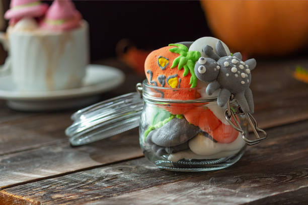 istock A creative idea for serving a sweet marshmallow snack for Halloween. Selective focus. Halloween concept 1345181136