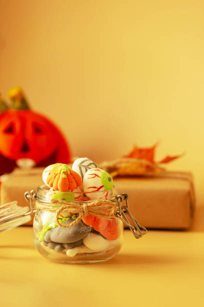 istock A creative idea for serving a sweet marshmallow snack for Halloween. Selective focus. Halloween concept 1345181263