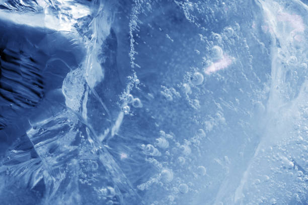 istock beautiful blue ice with cracks. frosty background 1345183114