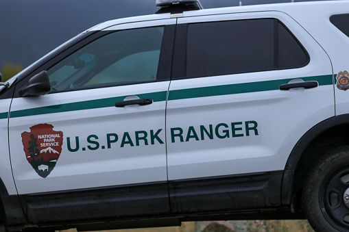 A National Park Ranger SUV sits on the side of the road in Yellowstone National Par September 28, 2019