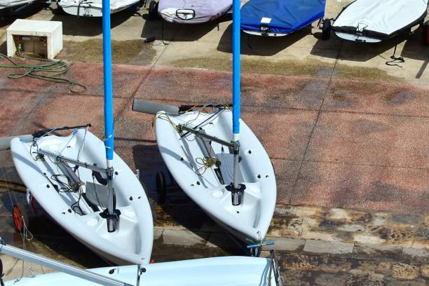 istock Sailing white boats on the shore 1345186201