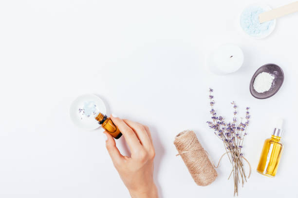 istock Woman hands mix homemade cosmetics adding essential oil 1345186250