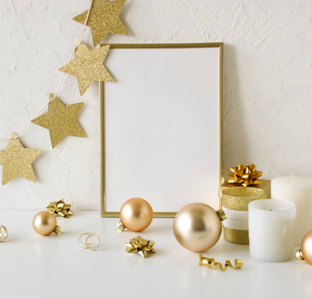 istock Gold frame mockup blank paper and Christmas decoration 1345186367