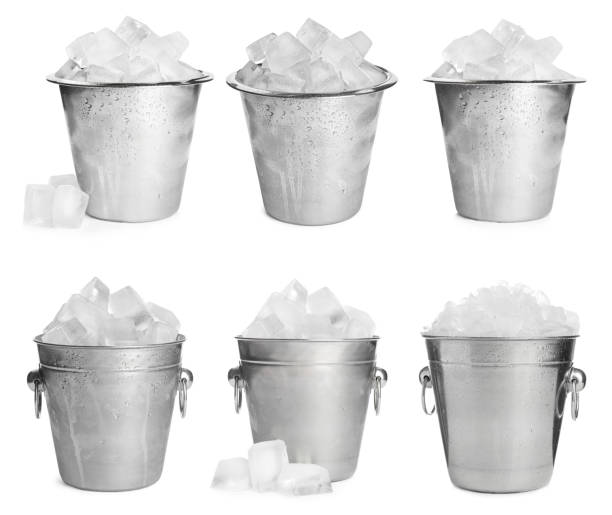 istock Set of different metal buckets with ice cubes on white background 1345189629