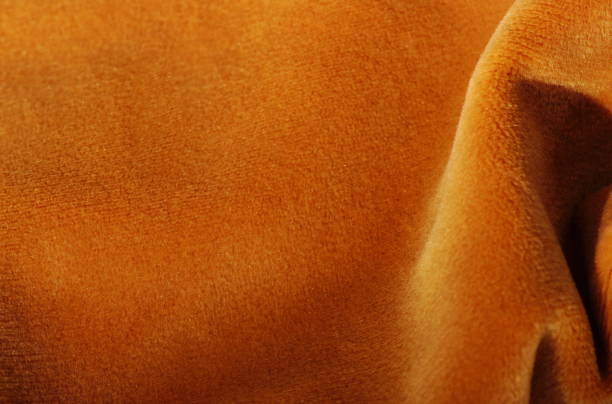 istock Velvet texture orange  color background, 1345189893