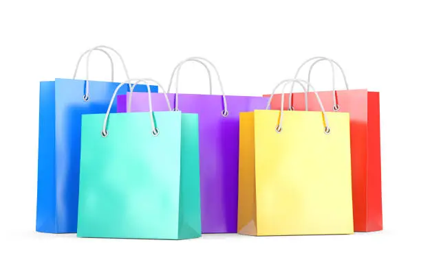 Group of color paper shopping bags isolated on white background. Business, retail, sale and online commerce concept. 3D illustration