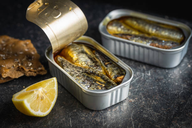 istock Canned sardines. Sea fish in tin can. 1345197173