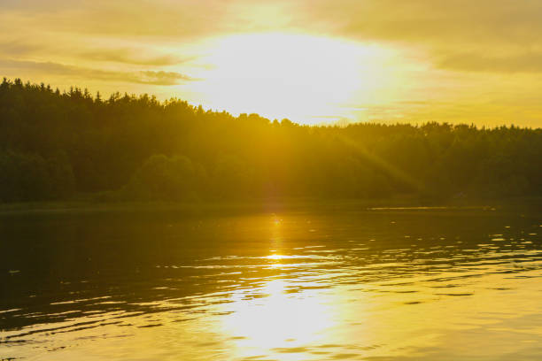istock Sunset river water reflection landscape. River sunset reflection. Sunset river landscape. Sunset orange river view. 1345201320