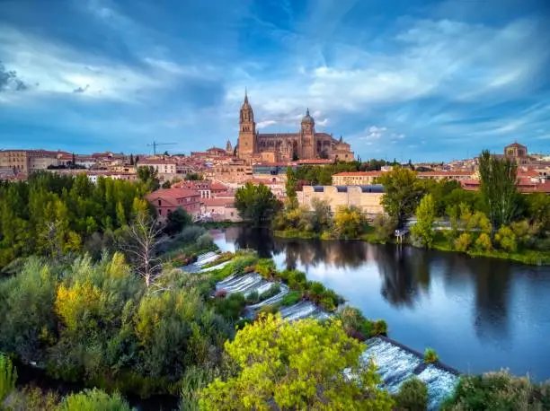 View of the Salamanca cathedral in the Tormes river in Spain.