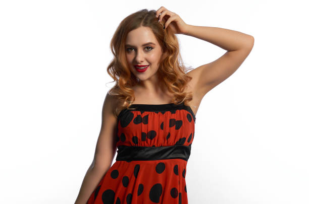 a girl in a red dress on a white background.fun and emotions