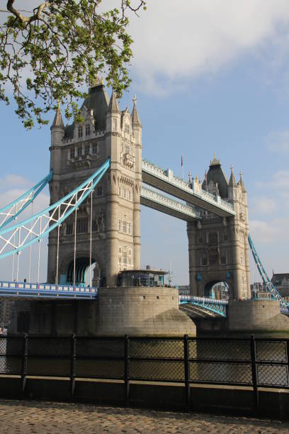 istock tower bridge in london across the river. 1345203838