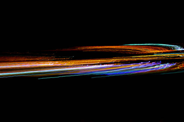 istock Abstract concepts with long exposure in city lights 1345216369