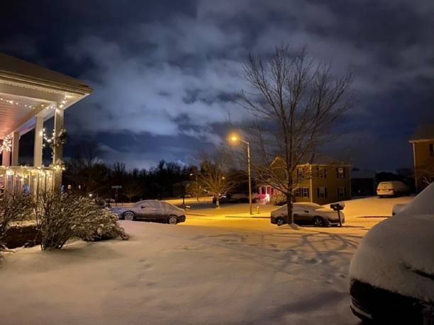 istock Snowy Night in Residential District 1345216980