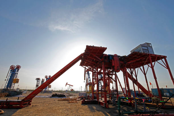 istock Oil pipe and oil drilling rig equipment 1345220394