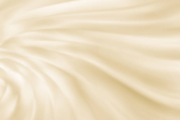 istock Champagne beige earth color gradient satin fabric drape background 1345222235