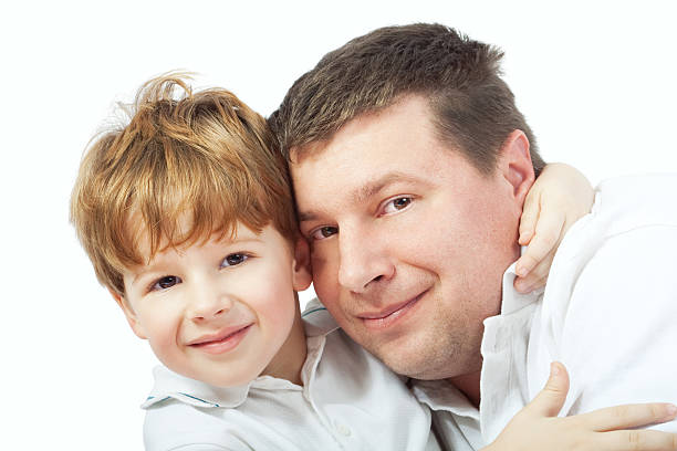 istock Togetherness, father with son in hug 134522841