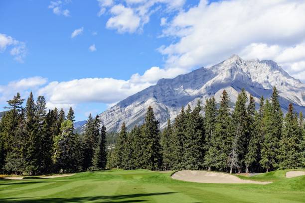istock A beautiful view of a par 4 golf hole on a course with a huge mountain in the background 1345230507