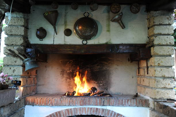 istock Built-in barbecue lit with high flames 1345235657